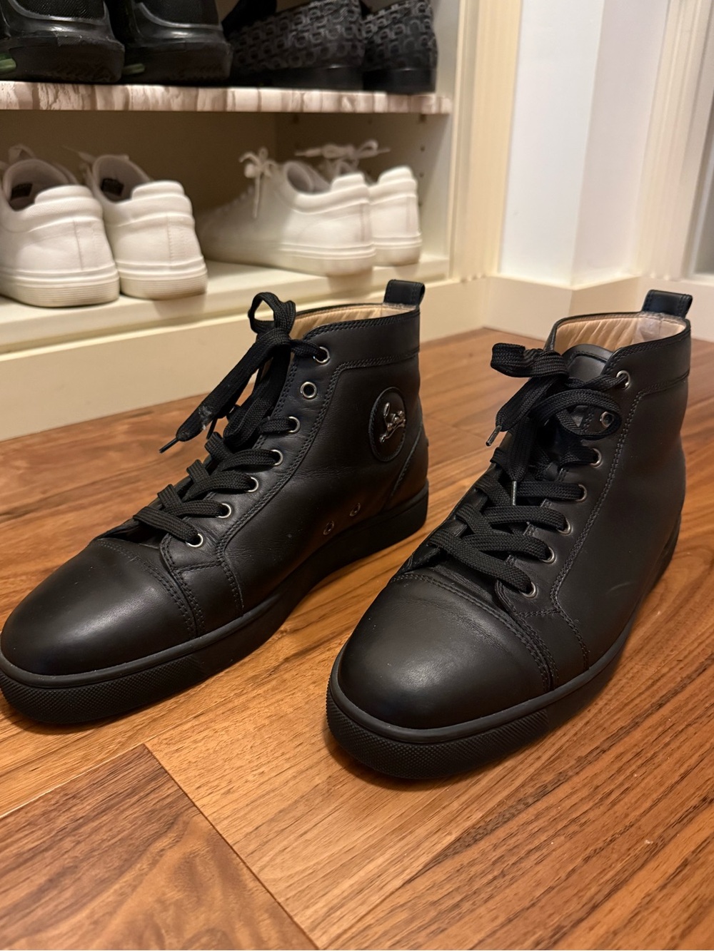 CHRISTIAN LOUBOUTIN Black High Top Calf Leather Sneakers